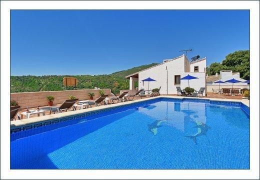 Casas Rurales Juzcar Centro Екстериор снимка